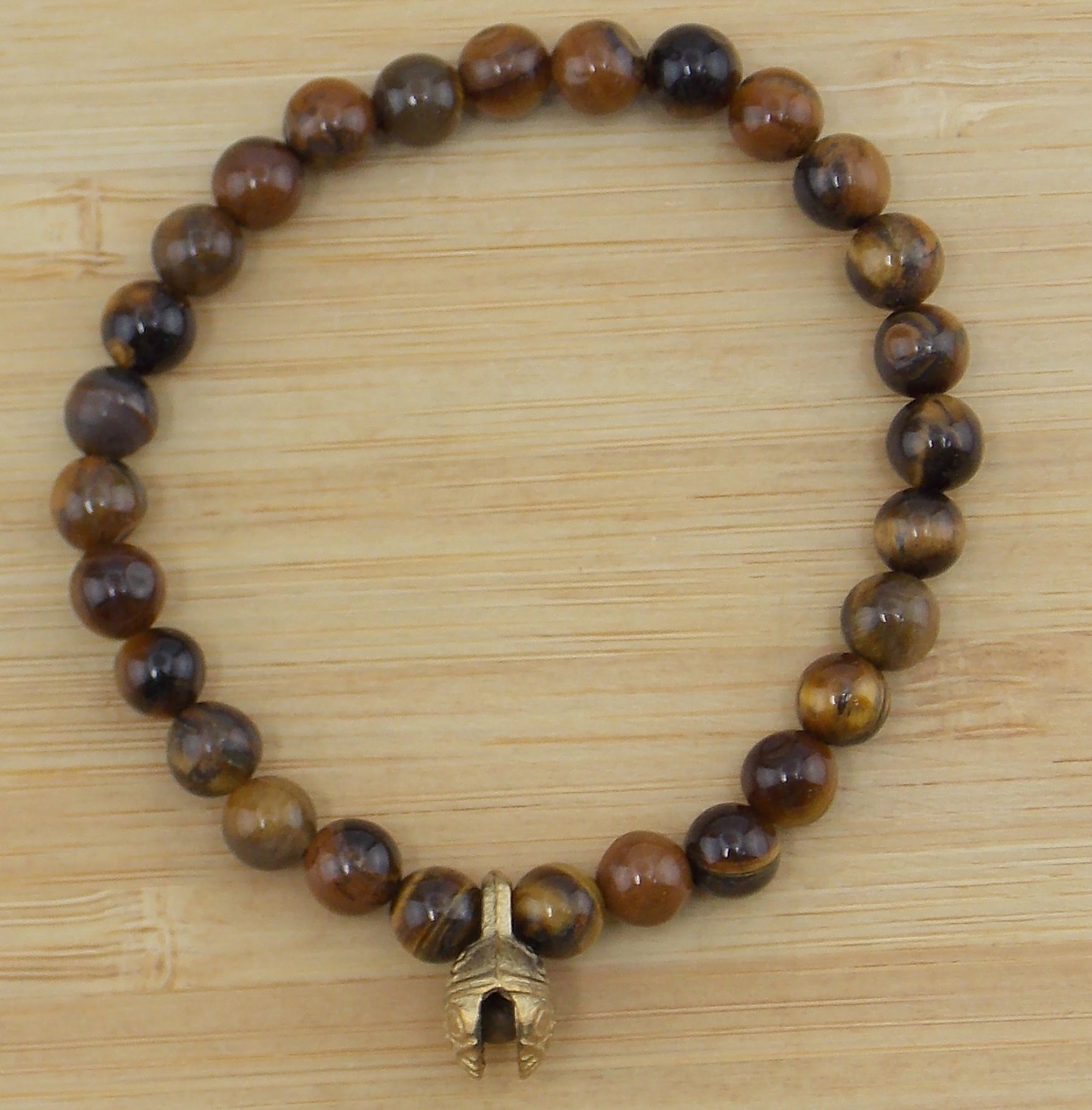 Pulsera de Ojo de tigre de 6mm con cascabel