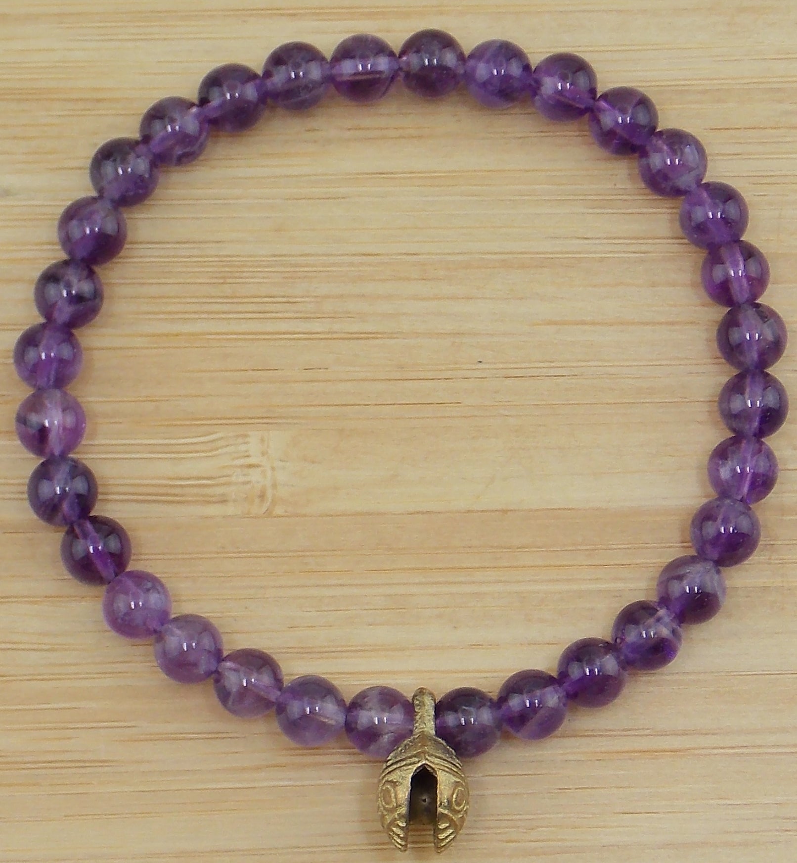 Pulsera de Amatista de 6mm con cascabel