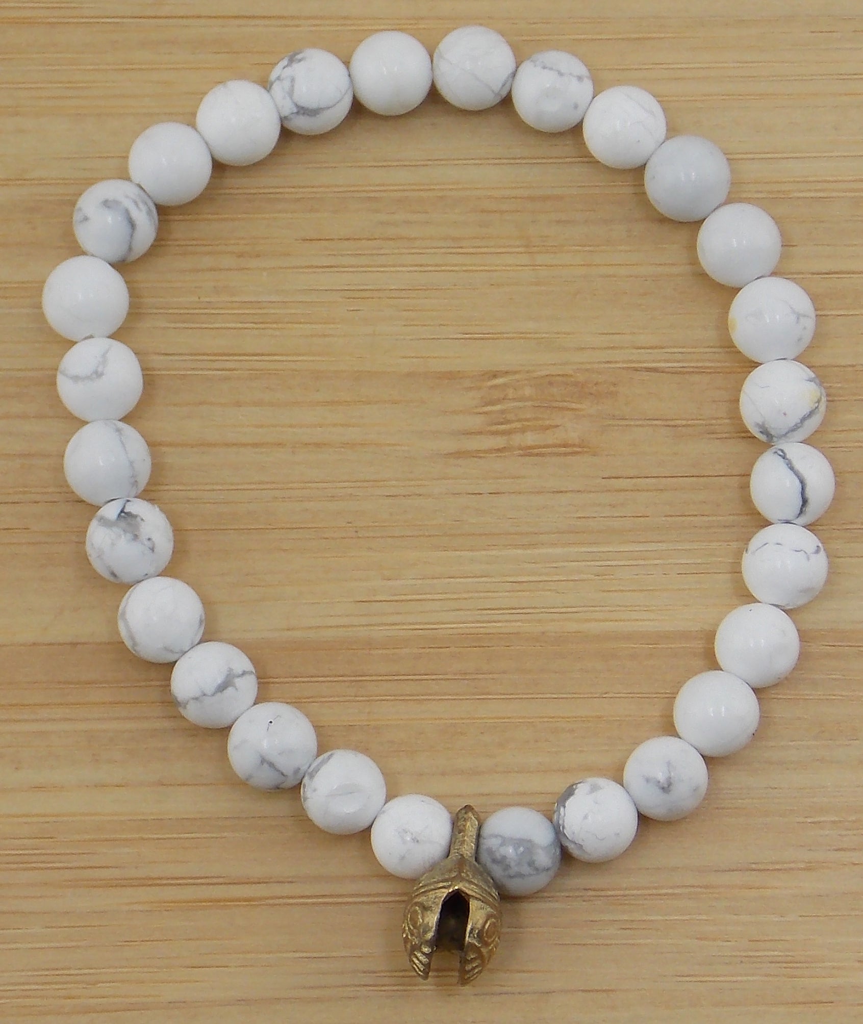 Pulsera de Howlite de 6mm con cascabel