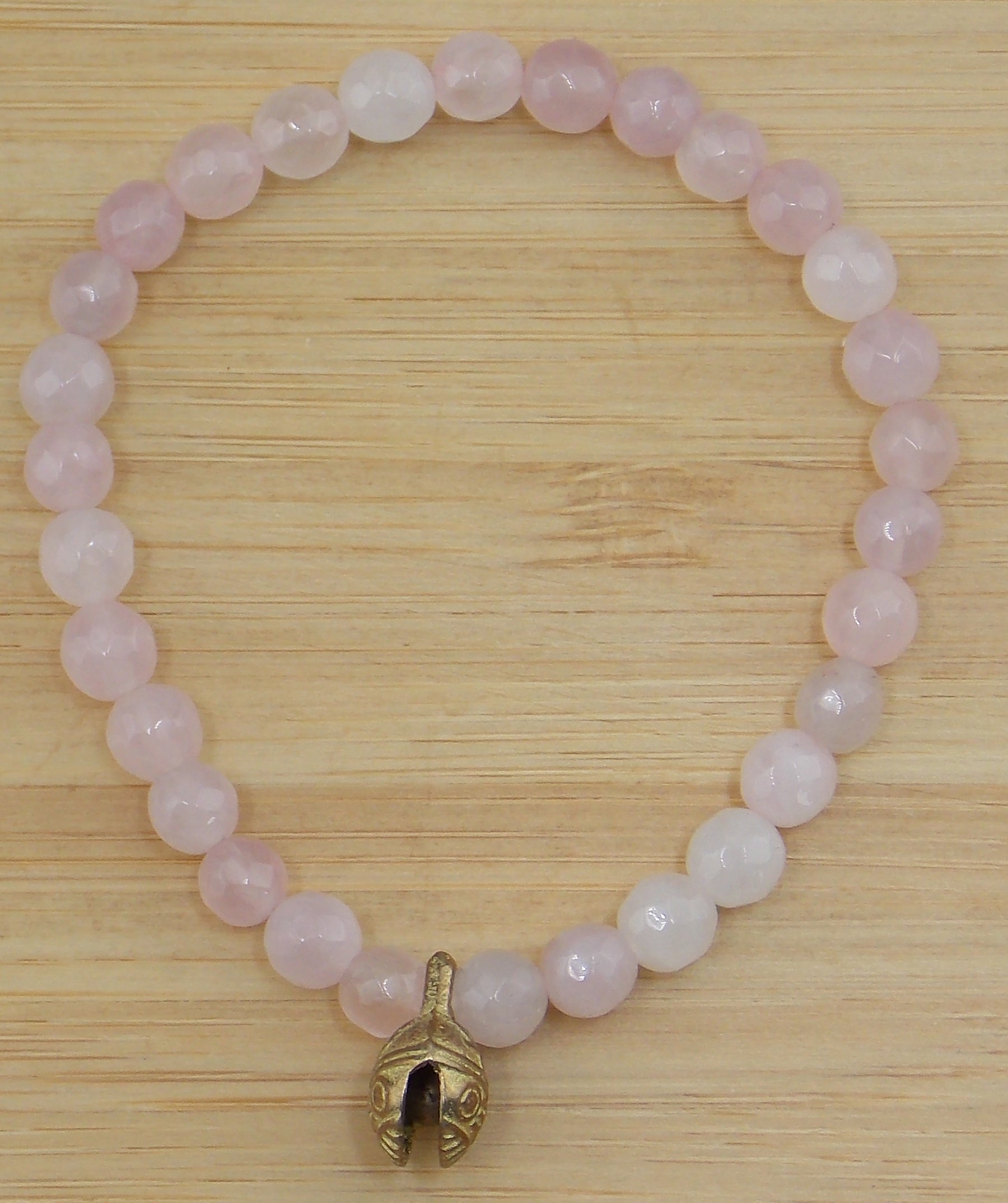 Pulsera de Cuarzo rosa de 6mm con cascabel