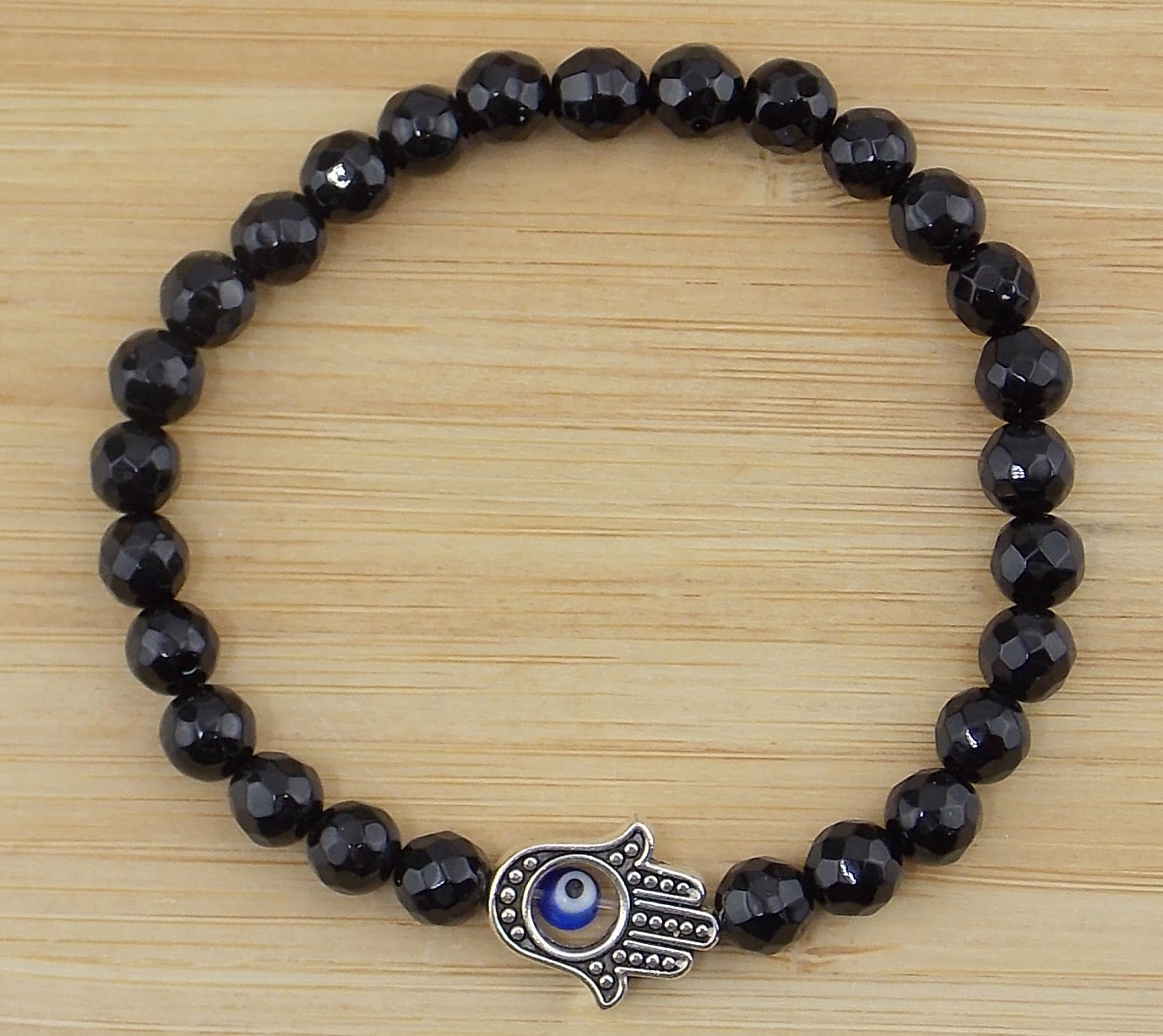 Pulsera de Ónix de 6mm con mano de Fátima