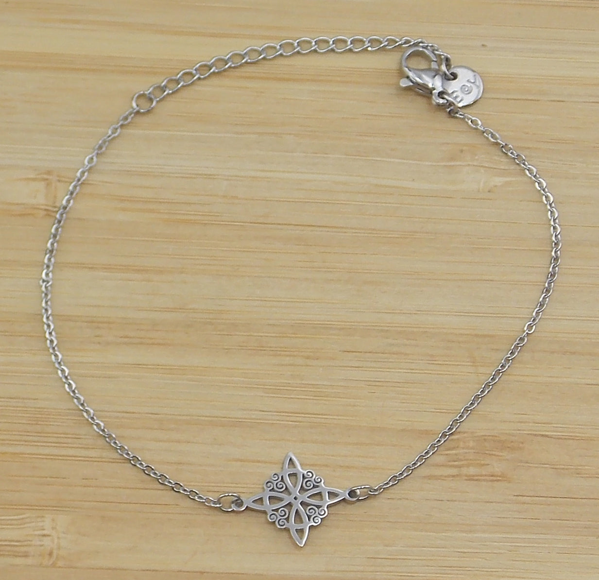Pulsera de Nudo de bruja de acero inoxidable plateado