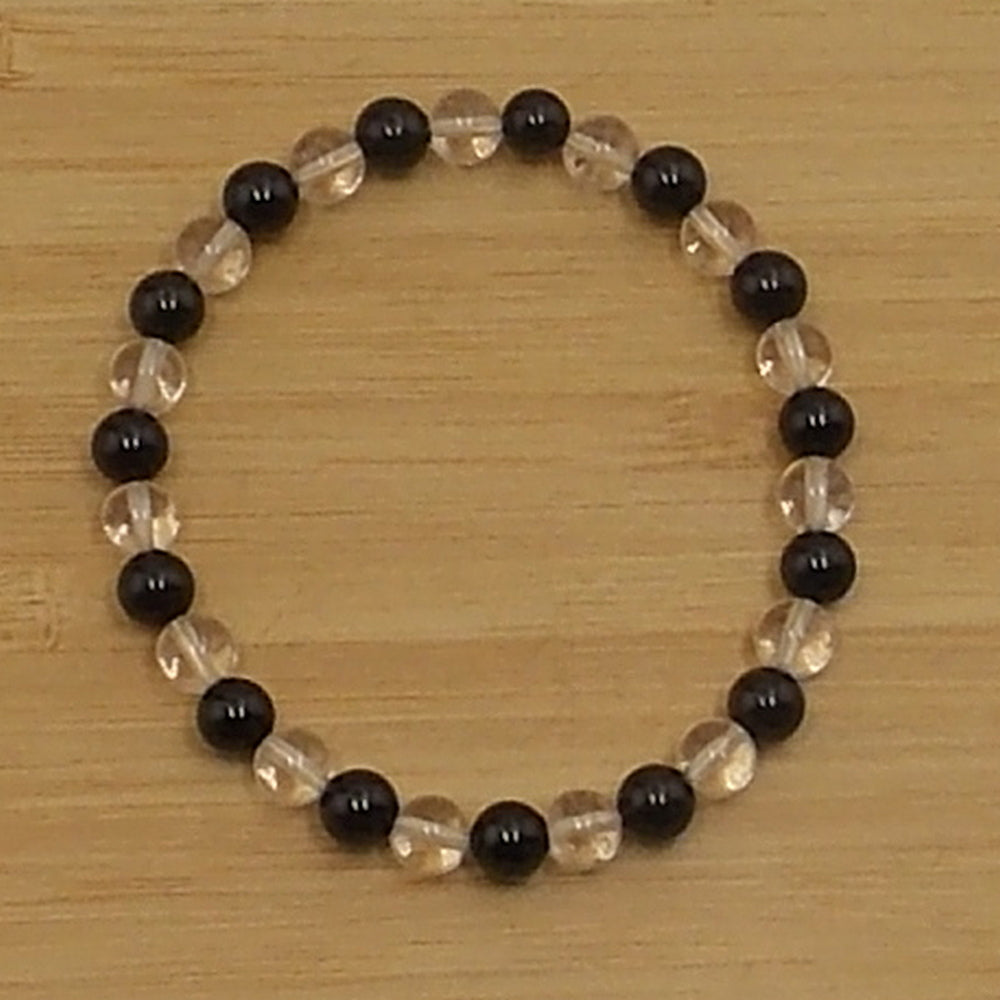 Pulsera escudo fortalecedor (Turmalina negra y Cuarzo blanco)