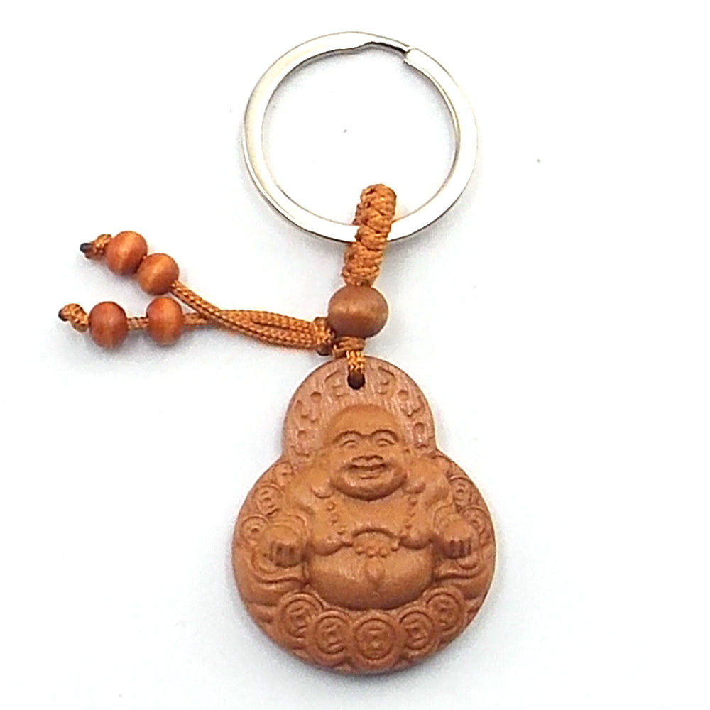 Llavero de madera de buda feliz