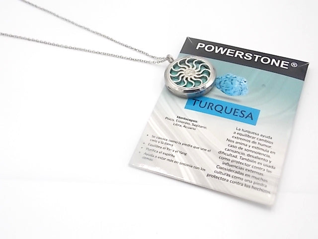 Colgante con motivo de Sol con una piedra de Turquesa