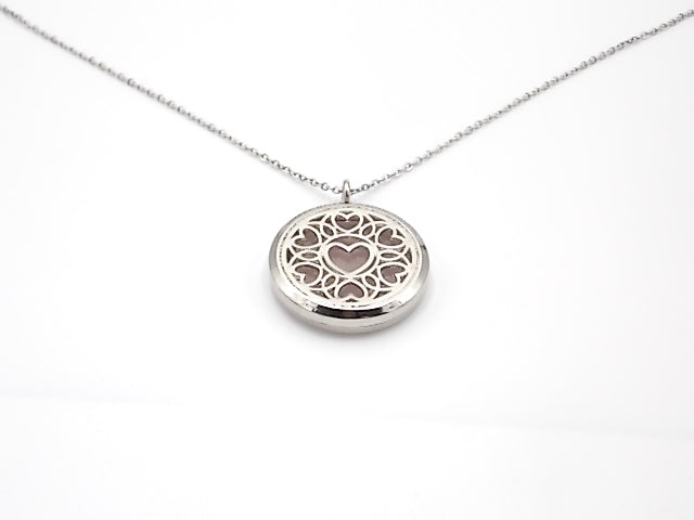Colgante con motivo de Corazón con una piedra de Cuarzo rosa