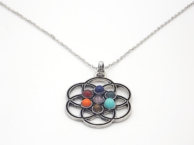 Colgante con las piedras naturales de los 7 chakras con diseño de Semilla de la vida