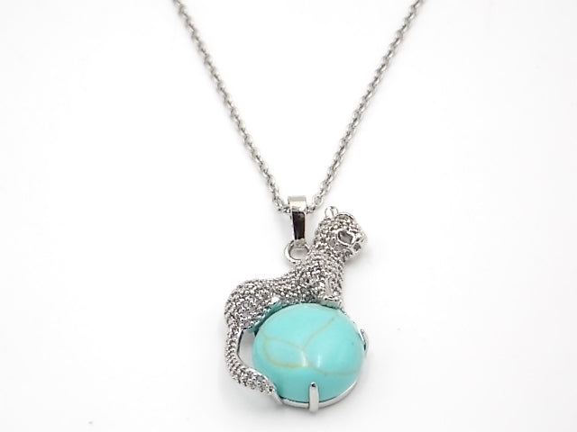 Colgante con forma de Leopardo de 34x21mm con piedra natural de Turquesa