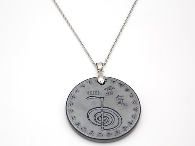 Colgante con medalla de Hematite Negro de doble cara con símbolos de Om y Choku rei de 47mm