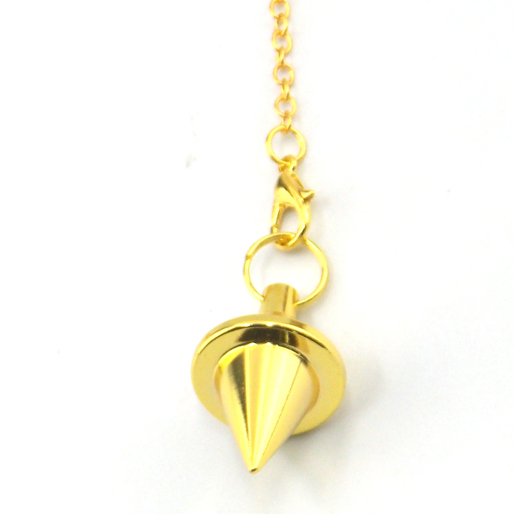Péndulo de color dorado