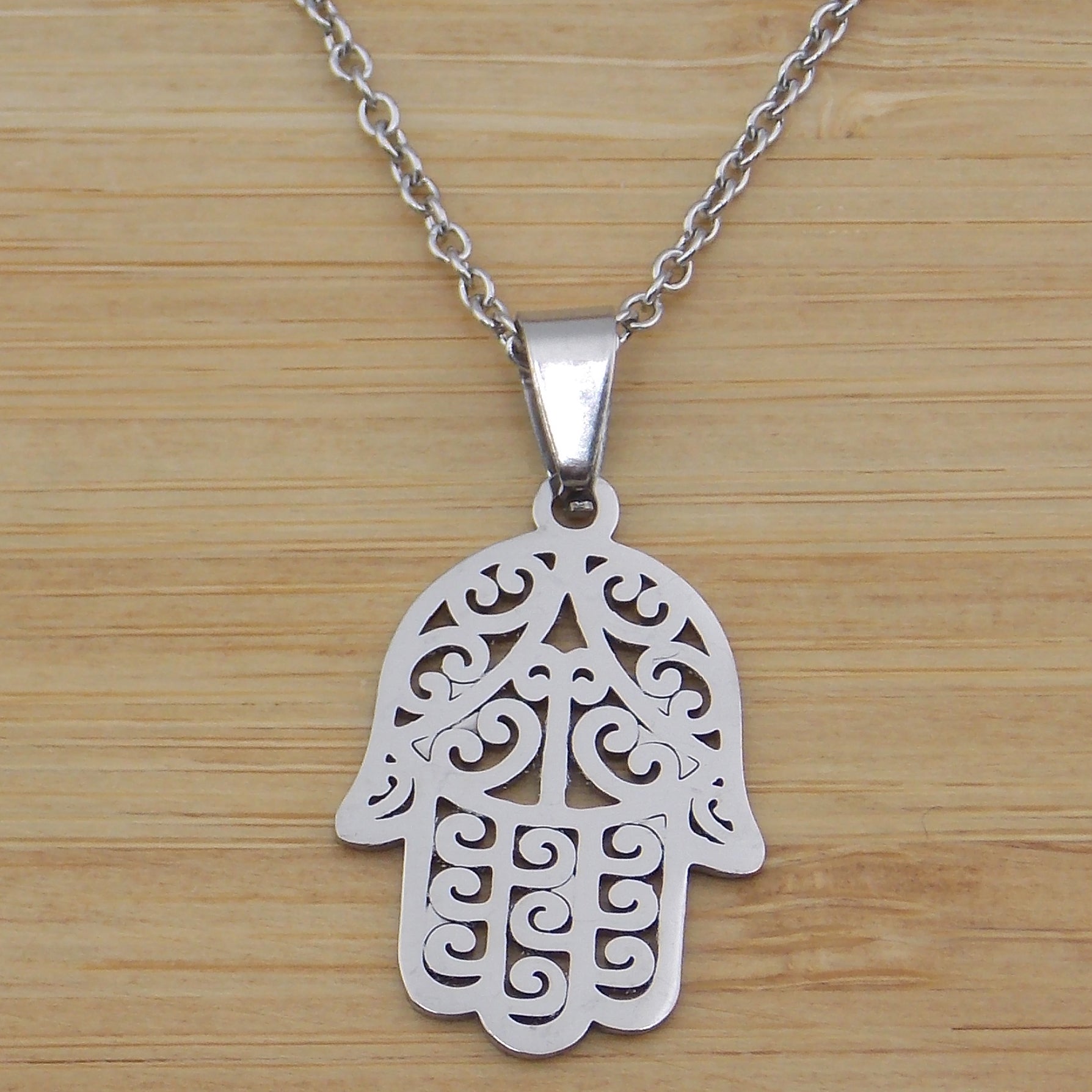 Colgante de acero inoxidable en forma de Mano de Fátima