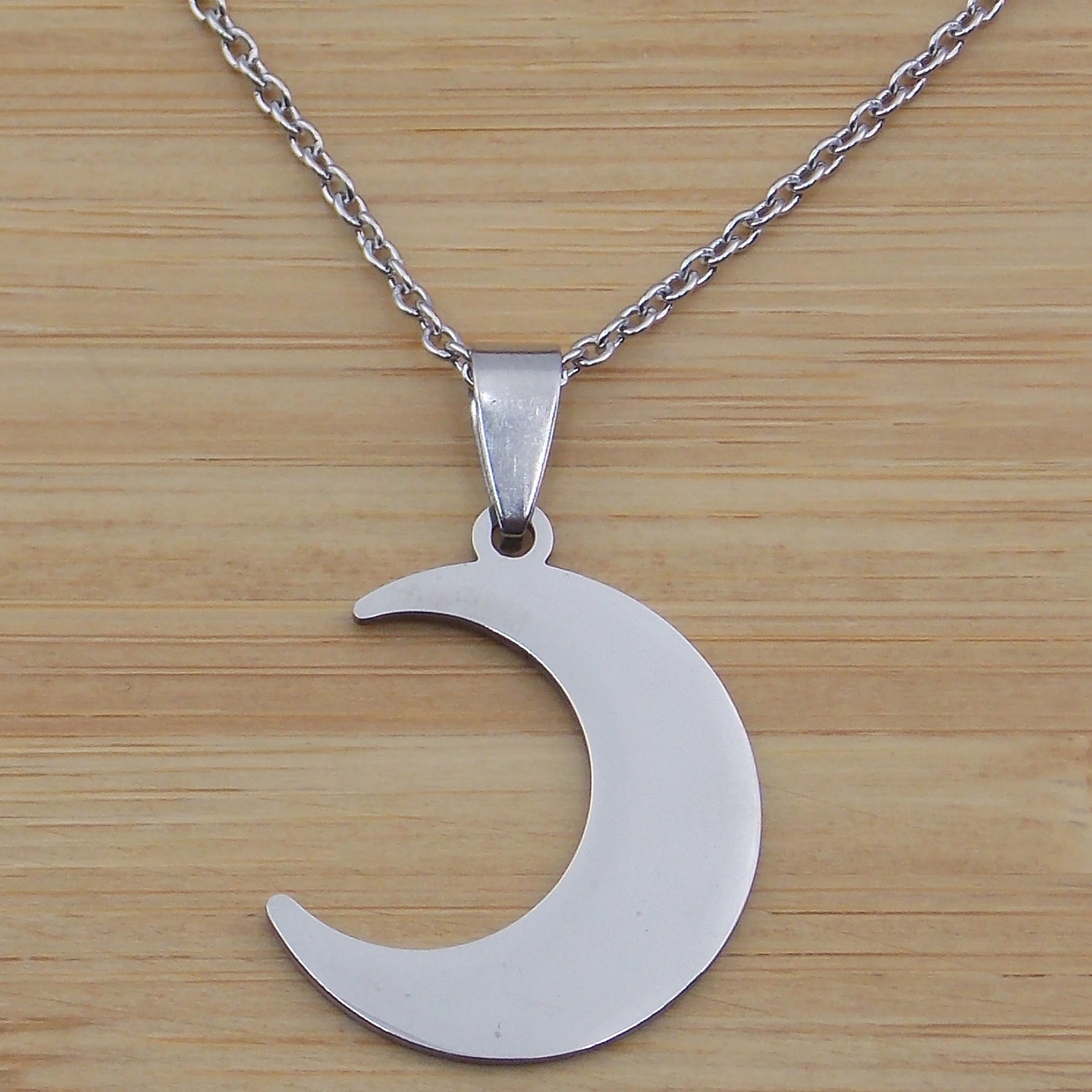Colgante de acero inoxidable en forma de Luna
