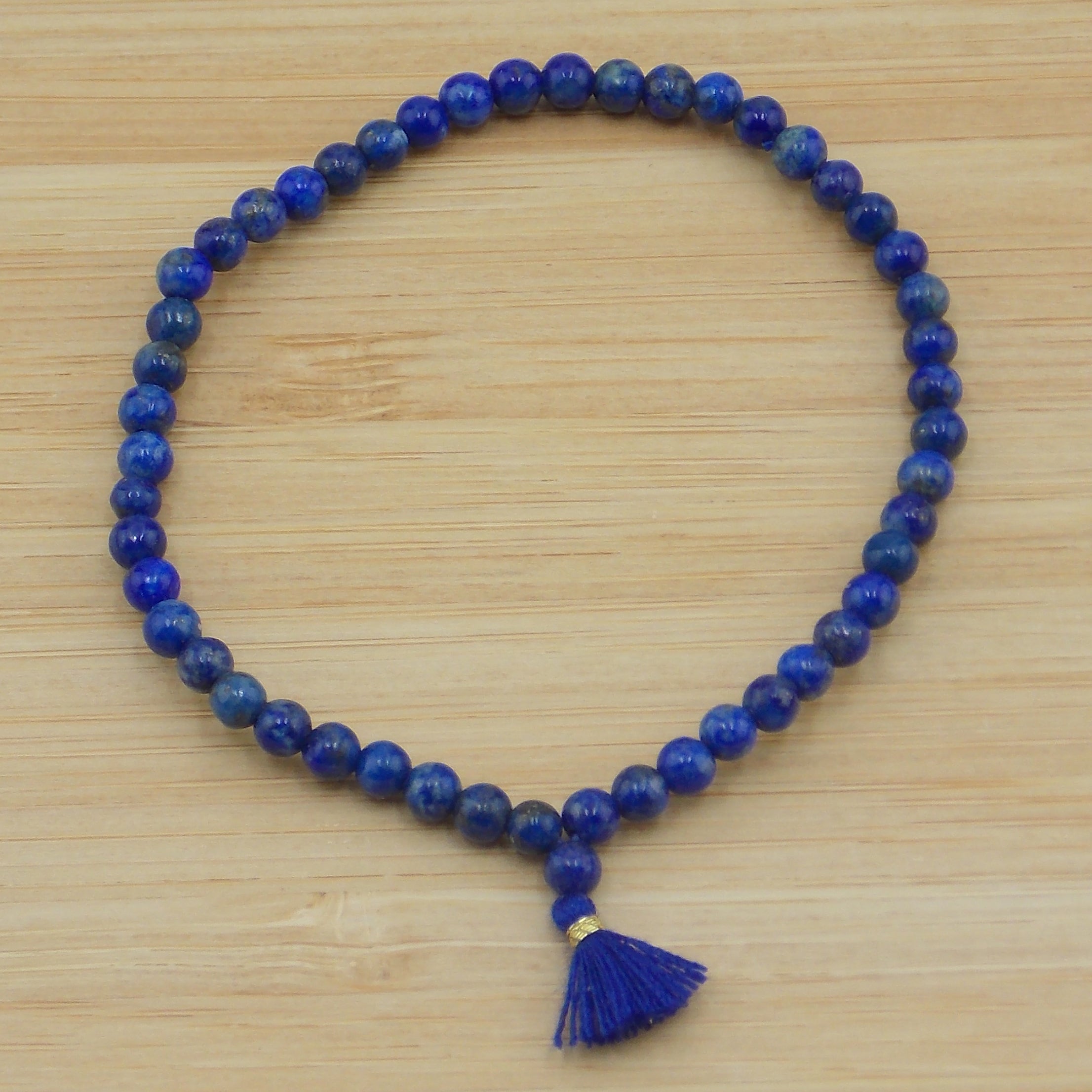 Pulsera de Lapislazuli de 4mm con borla