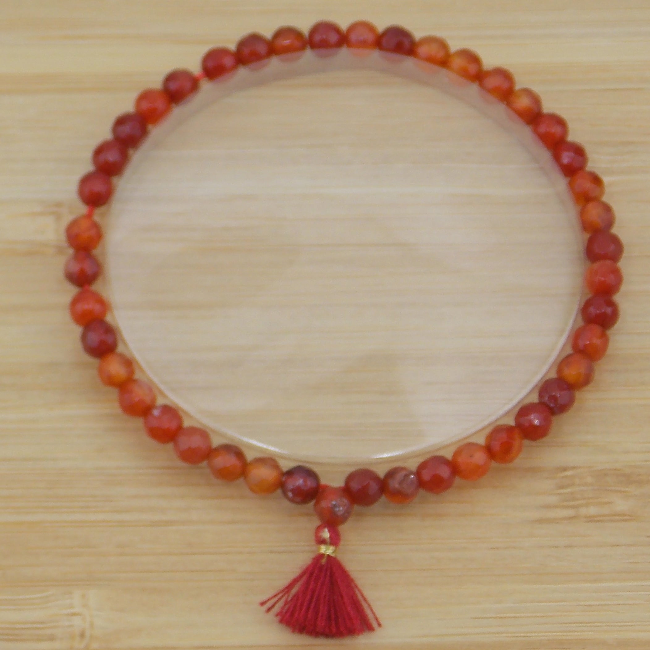 Pulsera de piedra natural de Carneola facetada de 4mm con borla