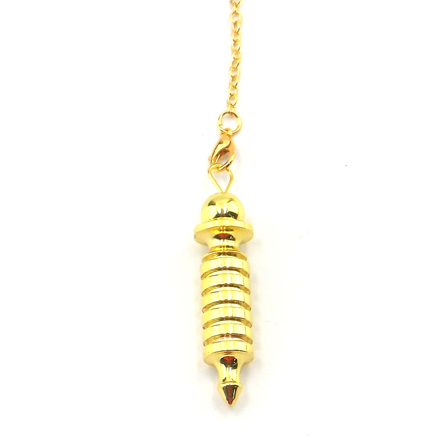 Péndulo de color dorado