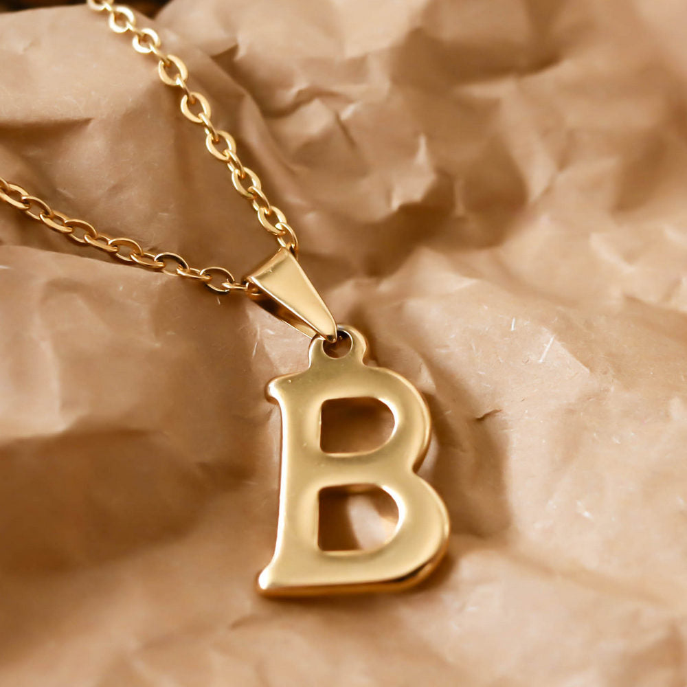 Colgante de acero inoxidable dorado con forma de letra B de 20mm