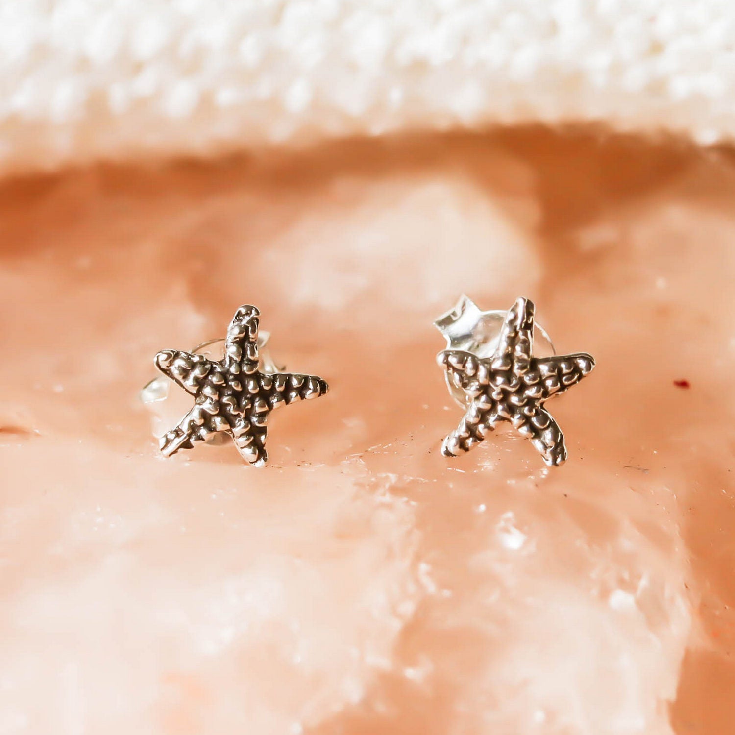 Pendiente en Plata de ley forma de Estrella de mar con tuerca mariposa.